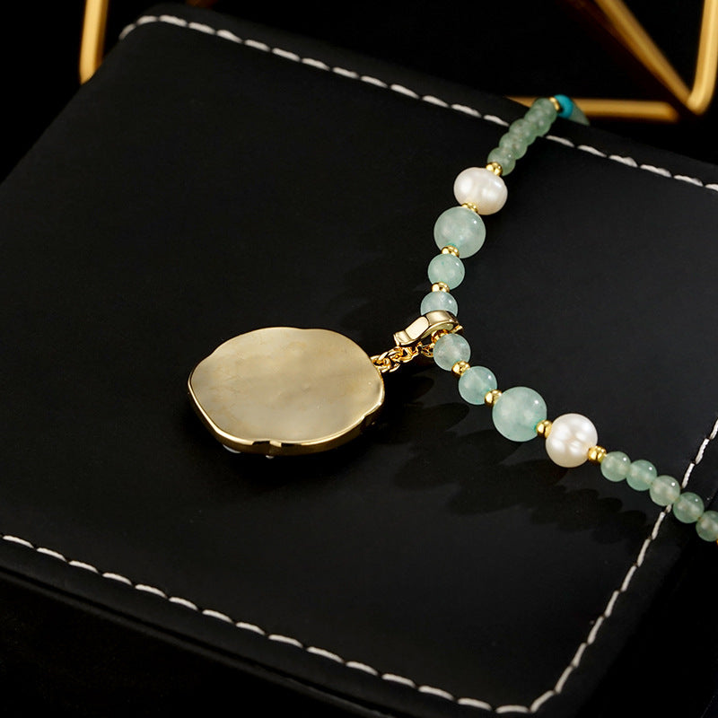 Floral Glazed Pendant Necklace – Elegant Floral Design with Jade, Pearls, and Turquoise Accents