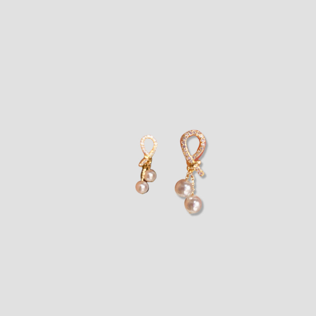 Elegant Micro-Inlaid Zirconia Knot Pearl Earrings – Sophisticated Luxury