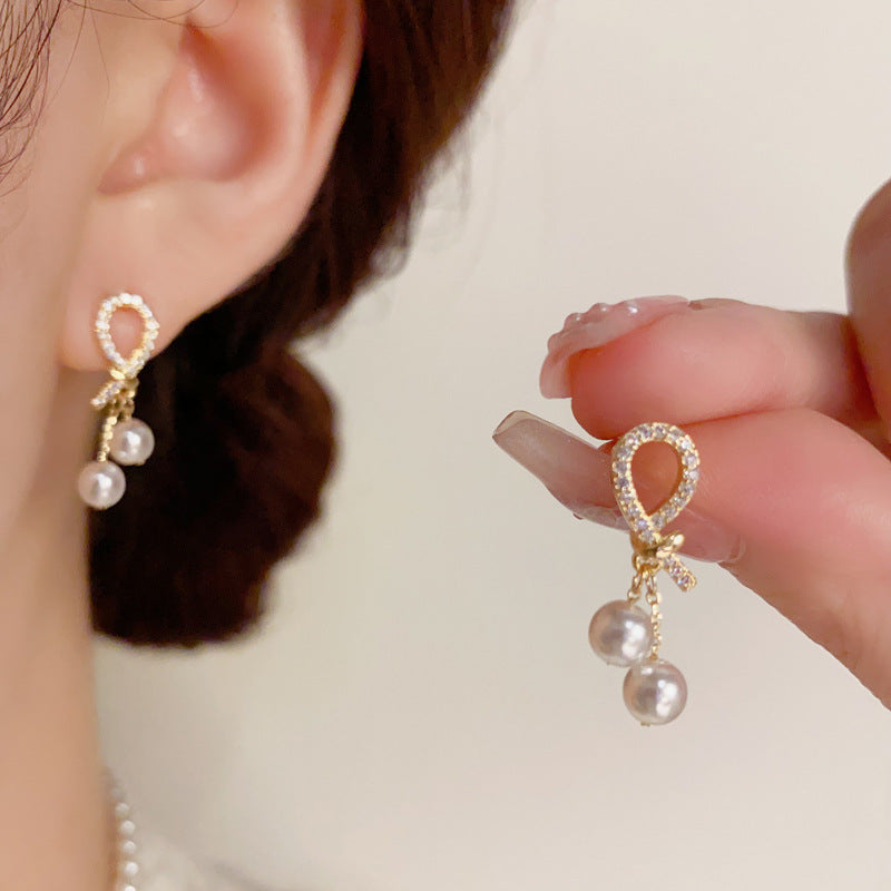 Elegant Micro-Inlaid Zirconia Knot Pearl Earrings – Sophisticated Luxury