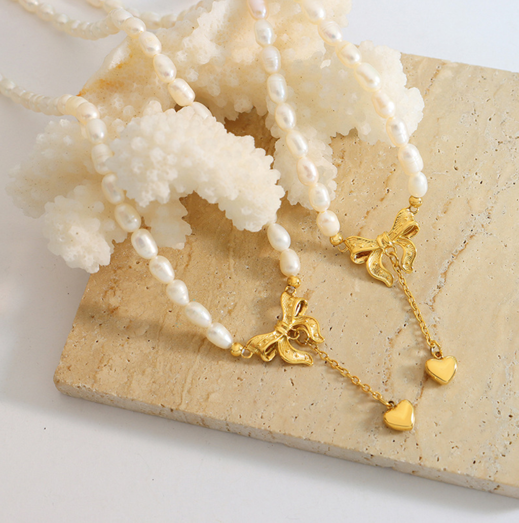 Hopeful Ribbon – Freshwater Pearl Necklace with Heartfall Accent