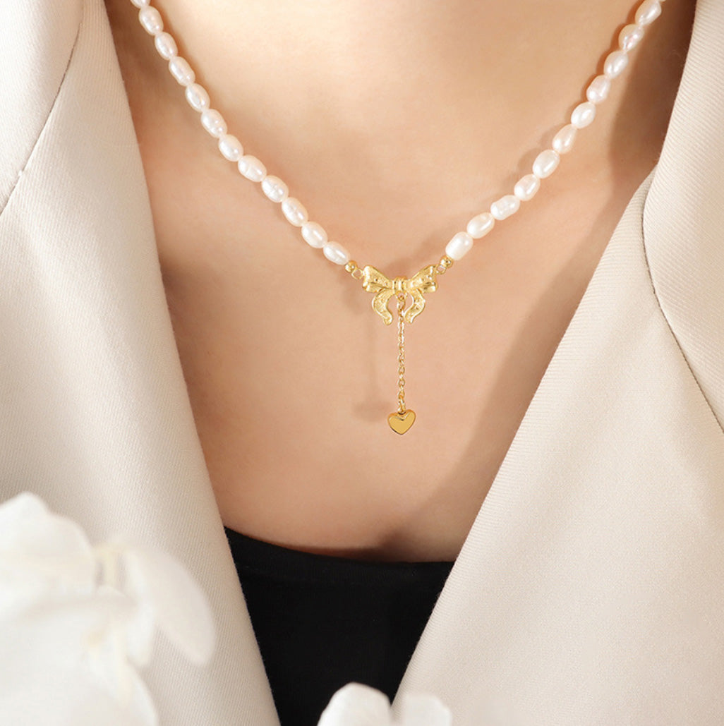 Hopeful Ribbon – Freshwater Pearl Necklace with Heartfall Accent